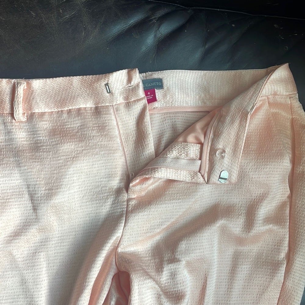 Vince Camino peach polyester pants.  Have a nice shine to them.  Never worn.